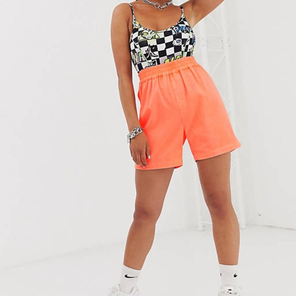 COLLUSION shorts in washed orange neon